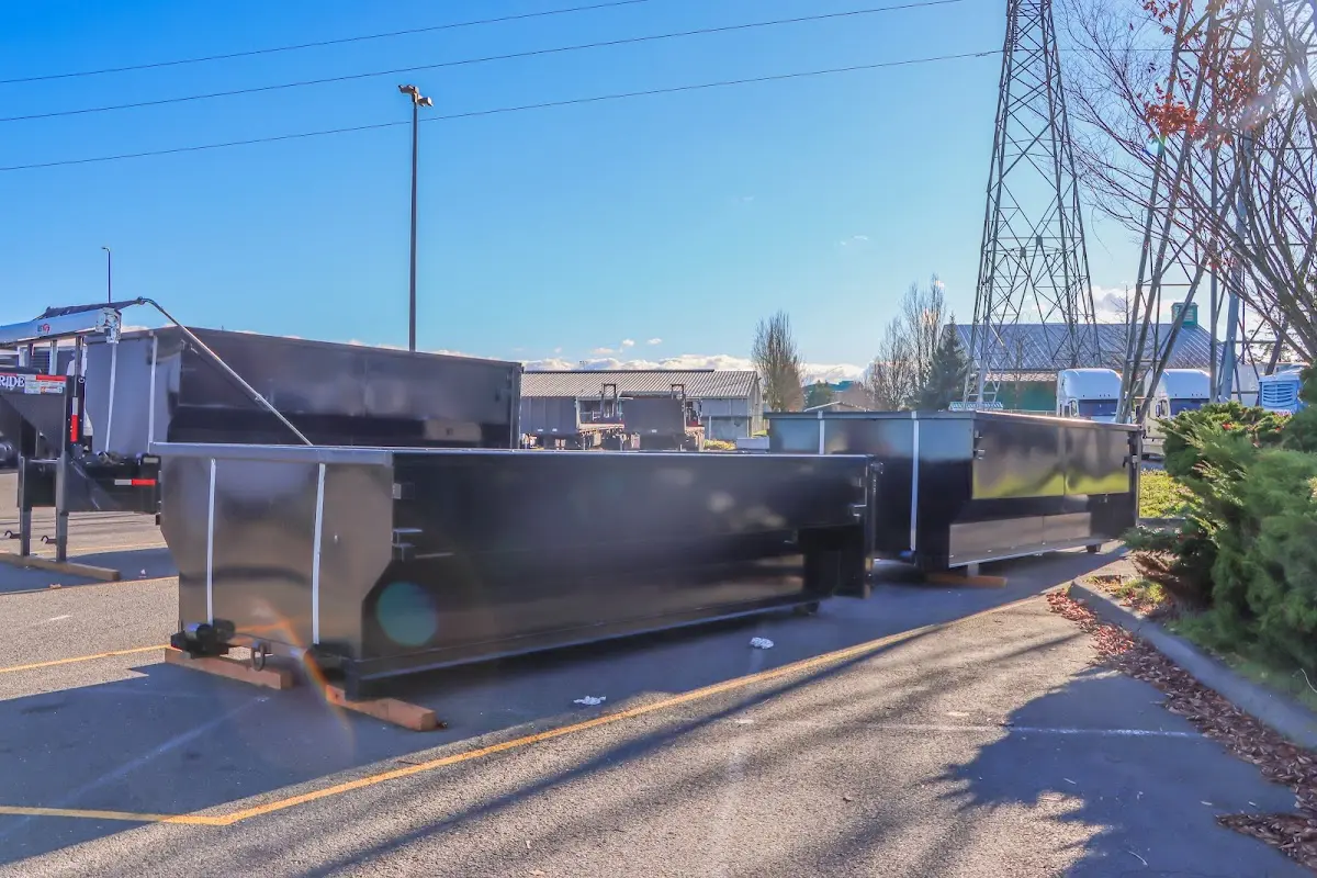 Roll-off dumpster ready for waste disposal at job site for Commercial Dumpster Rental in Van Buren